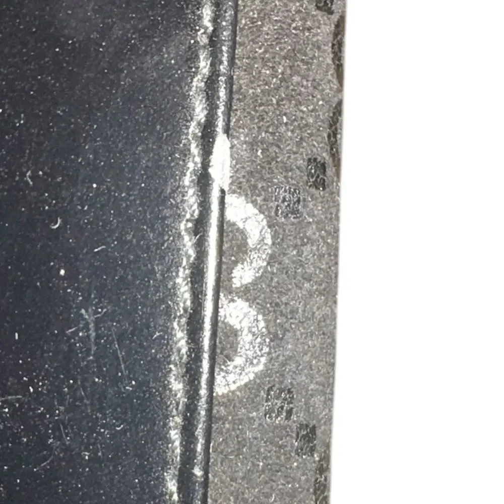 Gucci Textured Black velvet pouch.